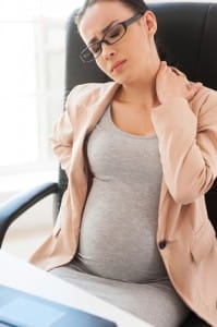 Pregnant at work.